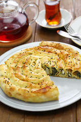 homemade rolled borek, spinach and feta cheese, turkish cuisine