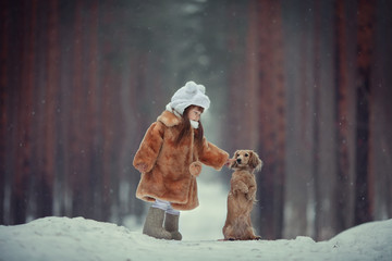 the girl and the Fox in winter