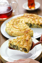 homemade rolled borek, spinach and feta cheese, turkish cuisine