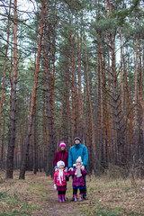 Fototapeta premium Rural family in autumn forest