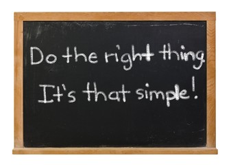 Do the right thing written in white chalk on a black chalkboard isolated on white