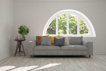 Idea of white room with sofa and summer landscape in window. Scandinavian interior design. 3D illustration