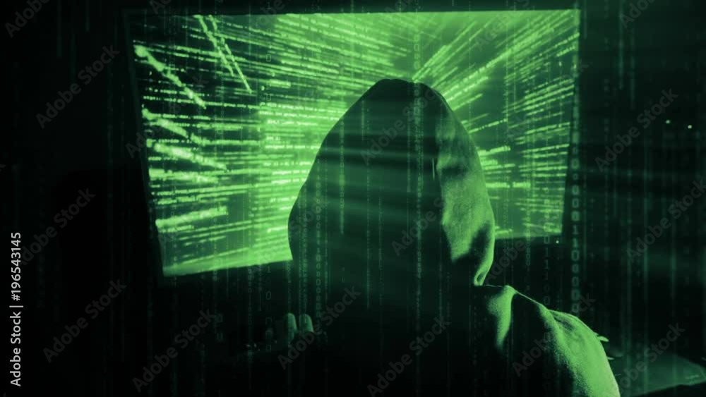 Poster a man hacker in a hood in a dark room works with the program code