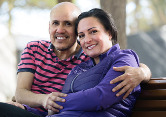 Mature couple sitting on the bench