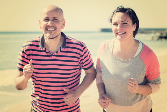 Couple Jogging Together Outdoor