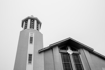 Fototapeta na wymiar Catholic church in small marina town