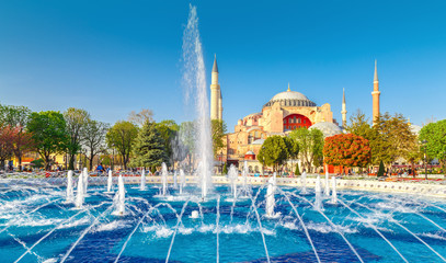Istanbul, Turkey. The Blue Mosque, (Sultanahmet Camii), iconic landmark in Istanbul. Beautiful spring scenery with fountain at the foreground and famous touristic destination Sultanahmet Camii.