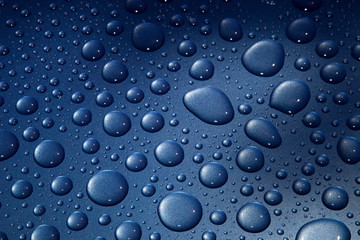 Water Droplets on Blue Metal