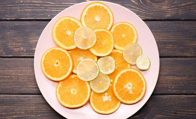  citrus slices on a wooden background