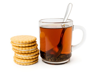 Cookies with glass Cup of tea on a white