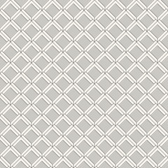 Regularly repeating geometric tiles of rhombuses.