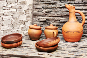 Fototapeta na wymiar many different pottery standing on the shelves