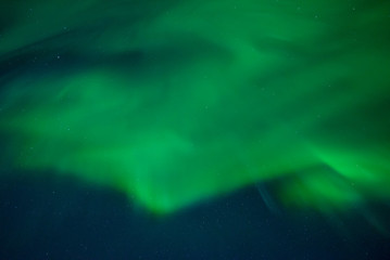 Northern lights over the vilage of Reine, Lofoten, Norway