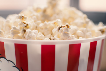 Popcorn samples in red and white bucket.