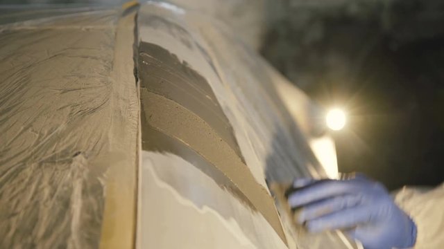 Applying the auto primer on the car surface 4K