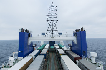ferry loaded with trucks in the open sea