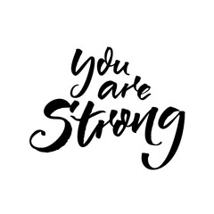 Fototapeta na wymiar You are strong. Motivational quote for posters and social media. Black brush script calligraphy isolated on white background. Inspirational inscription.