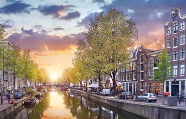 Fototapeta premium Channel in Amsterdam Netherlands houses river Amstel landmark