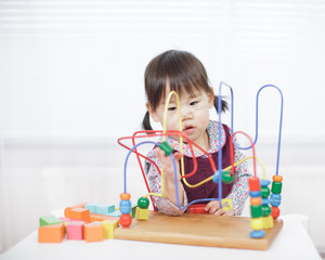 baby girl play abacus at home