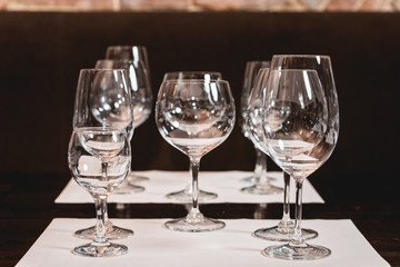 empty glasses of different shapes served for a wine tasting