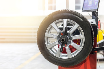 Car maintenance and service center. Vehicle tire  repair and replacement equipment.  Seasonal tire change