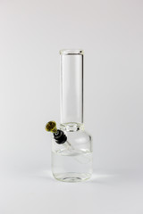 Clear glass bong isolated on white