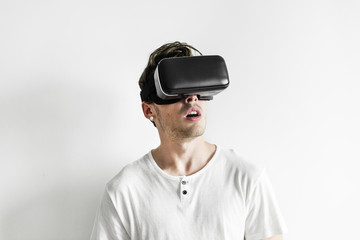 White man experiencing virtual reality with VR headset