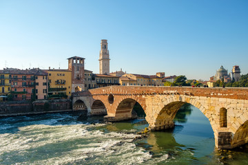 Fototapeta na wymiar Ponte Pietra bridge on Adige river