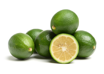 Fresh Green Limes isolated on white background