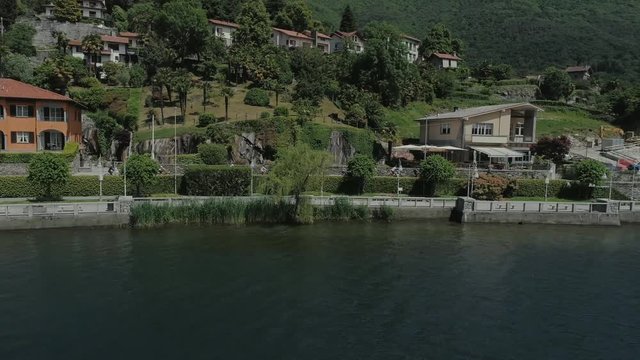 bicycle sumer italy Italian riviera houses drone flight near the mountains, Italy lake, drone 4k nature flight hootel