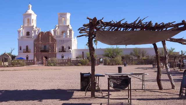 A beautiful establishing shot of Mission San Xavier del Bac, a historic Spanish Catholic mission near Tucson, Arizona.
