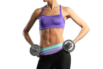 Fototapeta premium slim muscular girl with dumbbells
