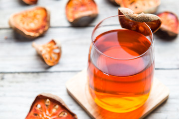 Bael juice on wooden table , healthy drink