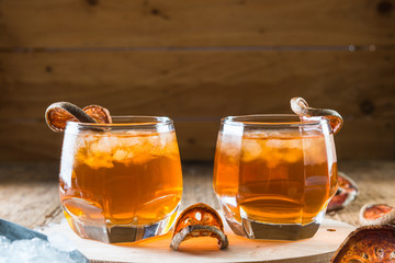 Bael juice ice tea on wooden table , healthy drink