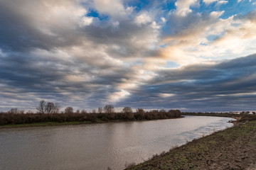 Obraz premium The bed of a calm plain river