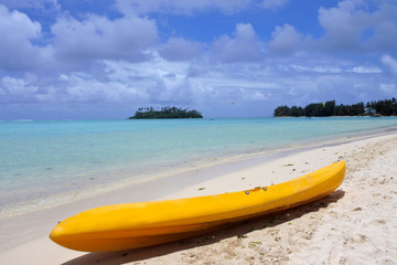 Yellow Kayak on Muri beach lagoon in Rarotonga Cook Islands