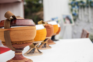 monk's alms bowl ware for taek rice and food from people to monk Buddism in Thailand in the every morning.

