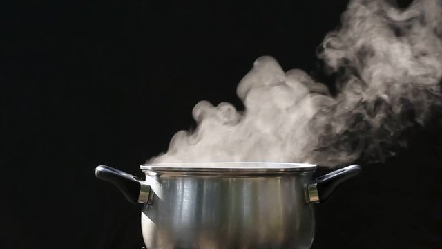 steam on pot in kitchen