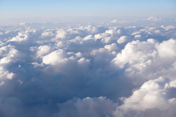 Sky and clouds outside of the window of the plan
