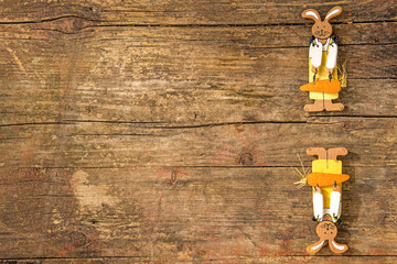Easter bunnies on a plank with copy space