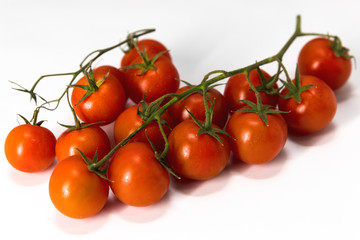 cherry tomatoes, placed on a white background, macro