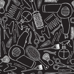 Seamless black-and-white pattern with hairdressers tools.