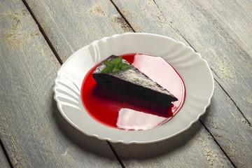 Chocolate decadence pie with mint and strawberry