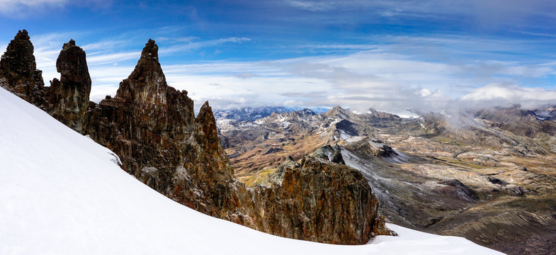 beautiful mountain landscape in Peru with rock needles and glacier in the foreground