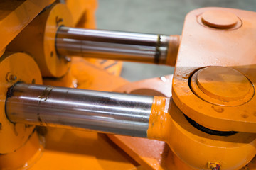 Hydraulic pistons in heavy duty machinery