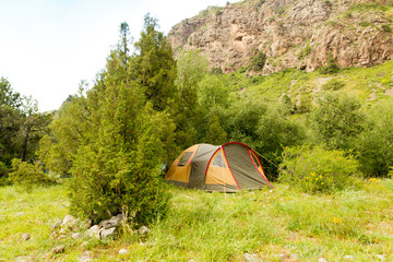 Tourist tent on nature in the mountains