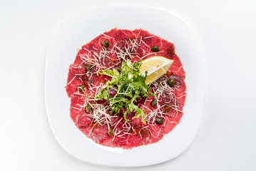 beef carpaccio on white