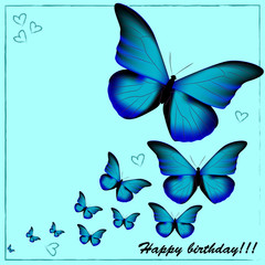 Obraz na płótnie Canvas postcard with a happy birthday, many blue butterflies on a blue background with hearts