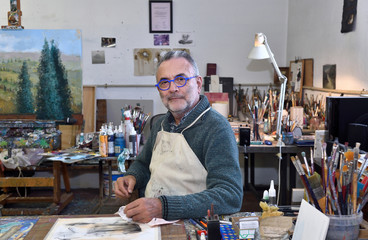 Portrait of artist in studio