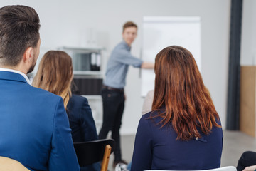 Group of businesspeople in a meeting or conference